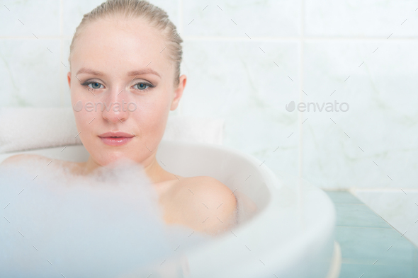 Bath Woman Enjoying Bathub Naturally Beautiful Female Relaxing In Bath With Foam In Bathroom 